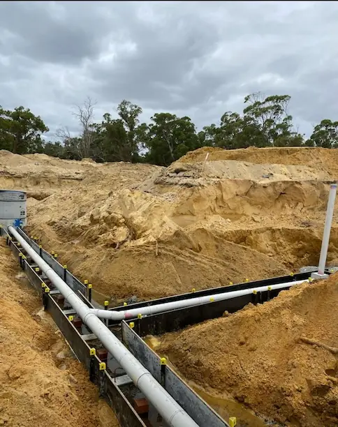 Sewer main install using pile and keel methods in Perth