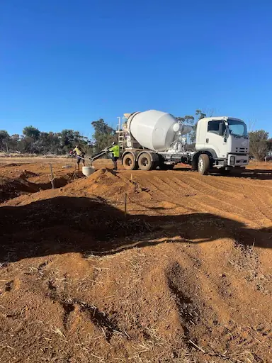 Remote earthworks supporting autonomous tower installation